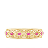 Rosec Jewels lab-created pink sapphire wedding band with Celtic detailing, showcasing intricate design and vibrant pink stones.