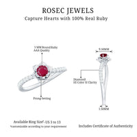 Natural 0.6 carat ruby flower engagement ring with diamond accents, set in a elegant ring design by Rosec Jewels.