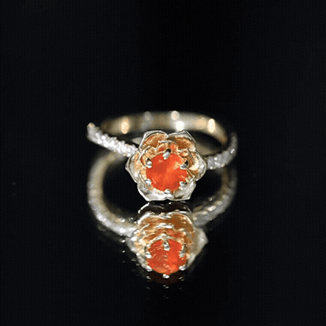 Rosec Jewels 0.45 Carat Fire Opal flower engagement ring with diamond, showcasing a vibrant orange gemstone and intricate floral design.
