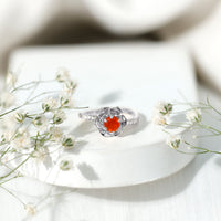 Rosec Jewels 0.45 Carat fire opal flower engagement ring with diamond accents, featuring a detailed floral design in sterling silver.