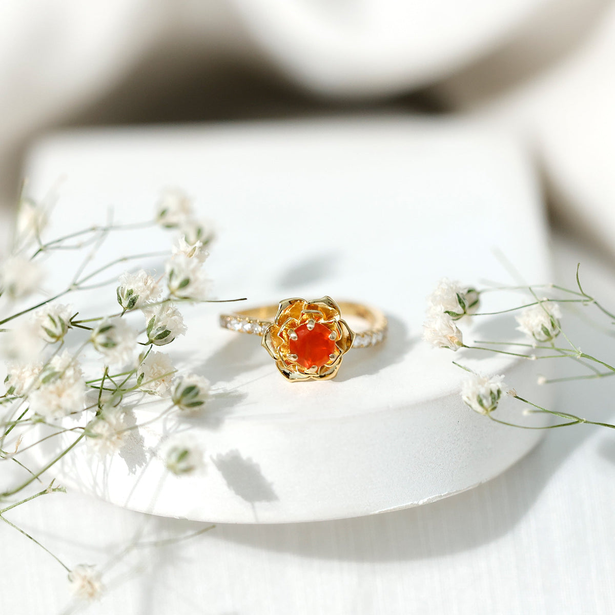 Rosec Jewels 0.45 Carat fire opal flower engagement ring with diamond, showcasing a detailed floral design and sparkling gemstone.