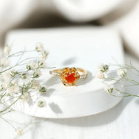Rosec Jewels 0.45 Carat fire opal flower engagement ring with diamond, showcasing a detailed floral design and sparkling gemstone.