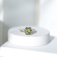 Nature Inspired Half Carat Peridot Flower Engagement Ring with Diamond