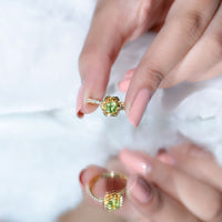 Nature Inspired Half Carat Peridot Flower Engagement Ring with Diamond