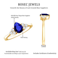 1.6 Carat Lab Blue Sapphire Teardrop Engagement Ring with Diamond Trio