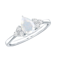 Pear Shape Moonstone Solitaire Ring with Diamond Trio