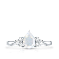 Pear Shape Moonstone Solitaire Ring with Diamond Trio
