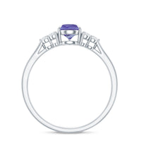 0.8 Carat Pear Shaped Tanzanite Engagement Ring with Diamond Trio