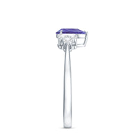 0.8 Carat Pear Shaped Tanzanite Engagement Ring with Diamond Trio