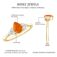 Pear-shaped 0.6 carat fire opal engagement ring with diamond trio by Rosec Jewels, showcasing a sparkling gemstone and elegant design.