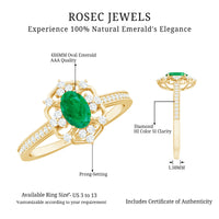 Vintage style emerald and diamond oval engagement ring from Rosec Jewels featuring intricate settings and sparkling gemstones.