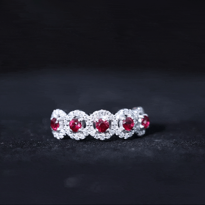 Yellow gold lab-grown ruby and diamond halo half eternity ring by Rosec Jewels, showcasing a sparkling gemstone and elegant design.