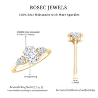 Oval and pear cut moissanite three-stone engagement ring by Rosec Jewels, showcasing sparkling gemstones and elegant band detail.