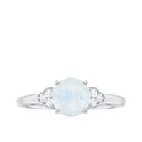 Rosec Jewels 1.50 CT moonstone solitaire engagement ring with a diamond trio setting, showcasing a elegant silver band.