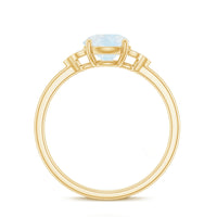 Rosec Jewels 1.50 CT moonstone solitaire engagement ring with diamond trio setting, showcasing a elegant gemstone and fine craftsmanship.