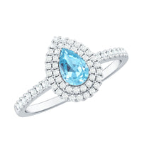 Elegant aquamarine and diamond teardrop engagement ring with double halo setting from Rosec Jewels.