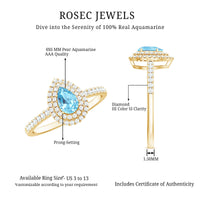 Elegant aquamarine and diamond teardrop engagement ring with double halo, featuring intricate design from Rosec Jewels.