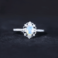 Oval Ethiopian Rainbow Opal vintage engagement ring with diamond accents, featuring a natural gemstone setting by Rosec Jewels.