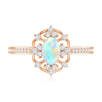 Oval Ethiopian Rainbow Opal engagement ring with vintage design and diamond accents, crafted by Rosec Jewels.