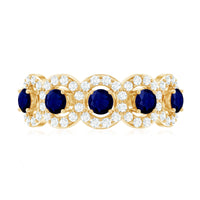 Classic blue sapphire half eternity ring with diamonds from Rosec Jewels, showcasing the elegant band and sparkling gemstones.