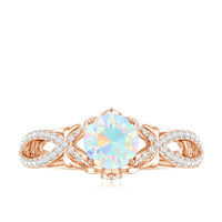 Ethiopian Opal and Diamond Engagement Ring with Crossover Shank