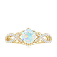 Ethiopian Opal and Diamond Engagement Ring with Crossover Shank