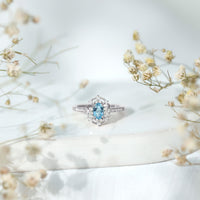 Vintage aquamarine and diamond engagement ring by Rosec Jewels featuring a detailed design and sparkling gemstones.