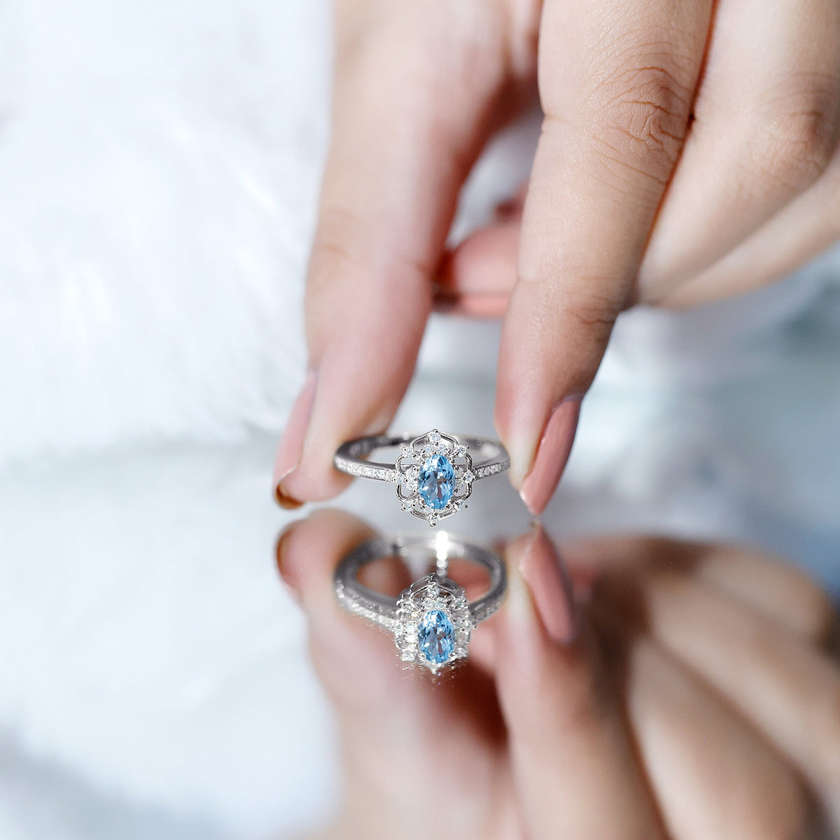 Vintage aquamarine and diamond engagement ring by Rosec Jewels with certificate, featuring intricate metalwork and sparkling gemstones.