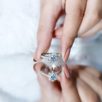 Vintage aquamarine and diamond engagement ring by Rosec Jewels with certificate, featuring intricate metalwork and sparkling gemstones.