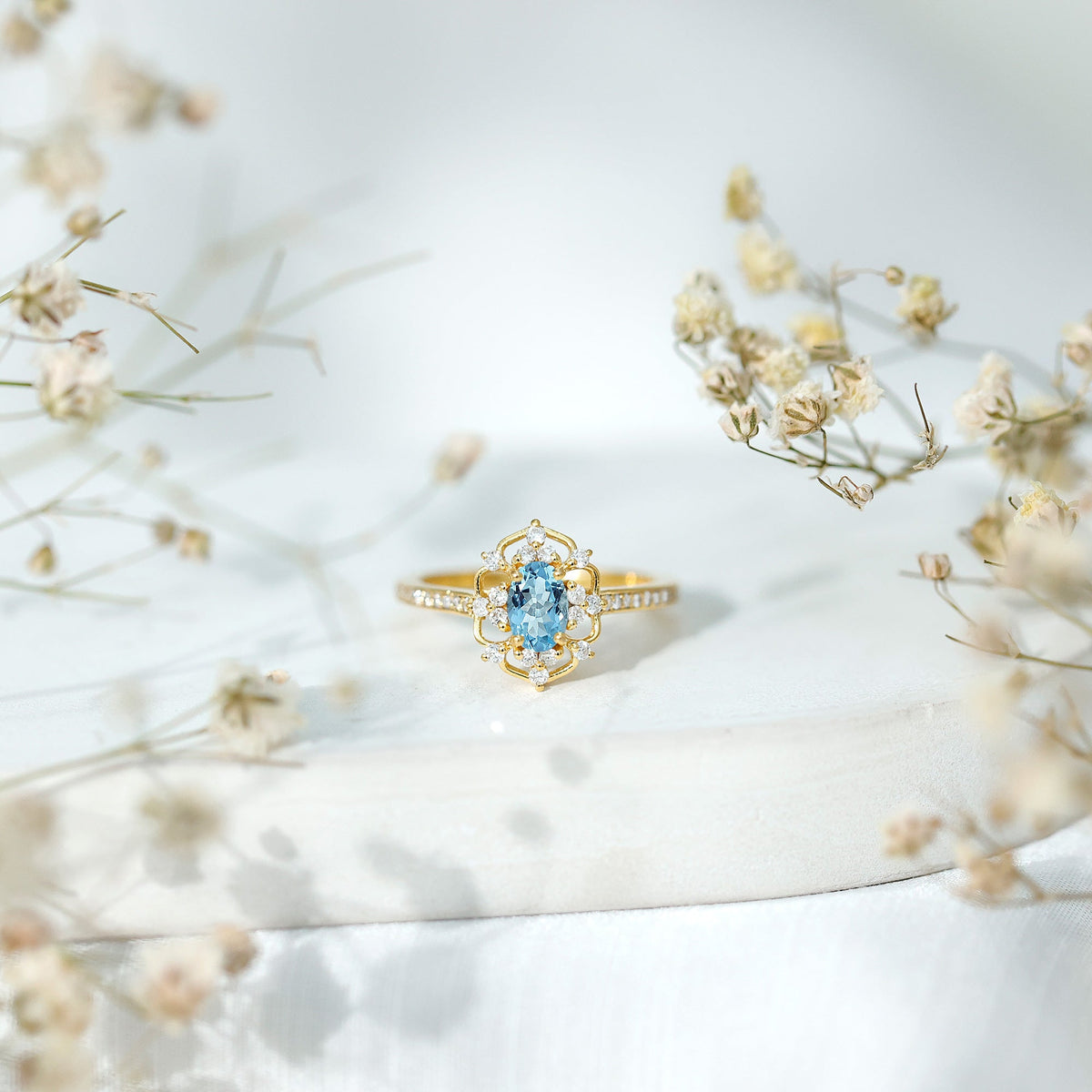 Vintage aquamarine and diamond engagement ring by Rosec Jewels with certificate, featuring a detailed band and vibrant gemstone.