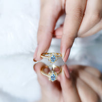 Vintage aquamarine and diamond engagement ring by Rosec Jewels featuring a detailed design and a certificate of authenticity.