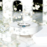 Baguette London Blue Topaz Solitaire Promise Ring
