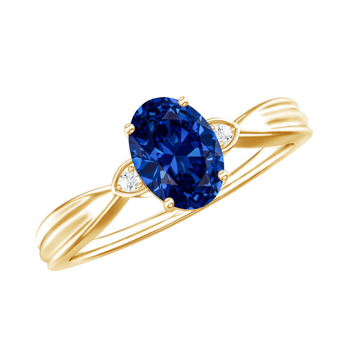 Oval lab-grown blue sapphire solitaire engagement ring with diamond accents, crafted by Rosec Jewels.