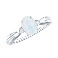 Oval cut moonstone solitaire ring with diamond accent from Rosec Jewels, showcasing the elegant gemstone setting.