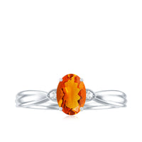Oval 3/4 CT Fire Opal engagement ring with diamonds from Rosec Jewels, showcasing the vibrant gemstone and sparkling accents.