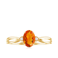 Oval shape fire opal engagement ring with diamonds from Rosec Jewels, showcasing the vibrant gemstone and sparkling accents.