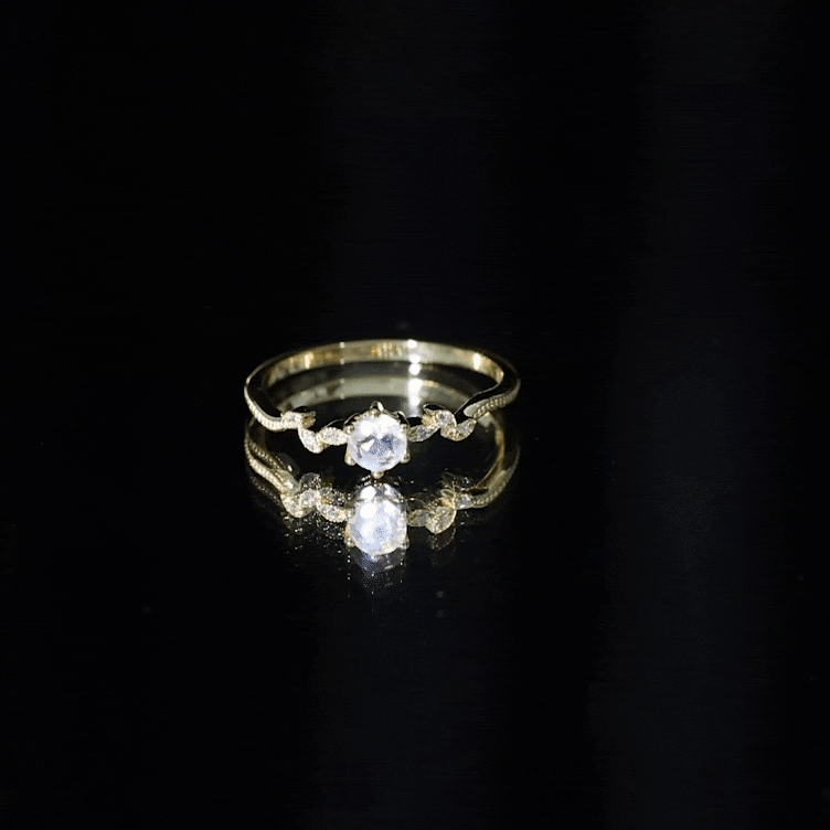 Nature-inspired moonstone diamond promise ring for women featuring a delicate band with moonstone and diamond accents by Rosec Jewels.