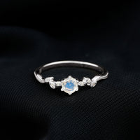Nature-inspired moonstone and diamond promise ring for women by Rosec Jewels, featuring a delicate band and shimmering gemstones.