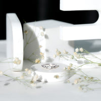 Nature-inspired moonstone and diamond promise ring for women by Rosec Jewels, featuring a delicate silver band and intricate design.