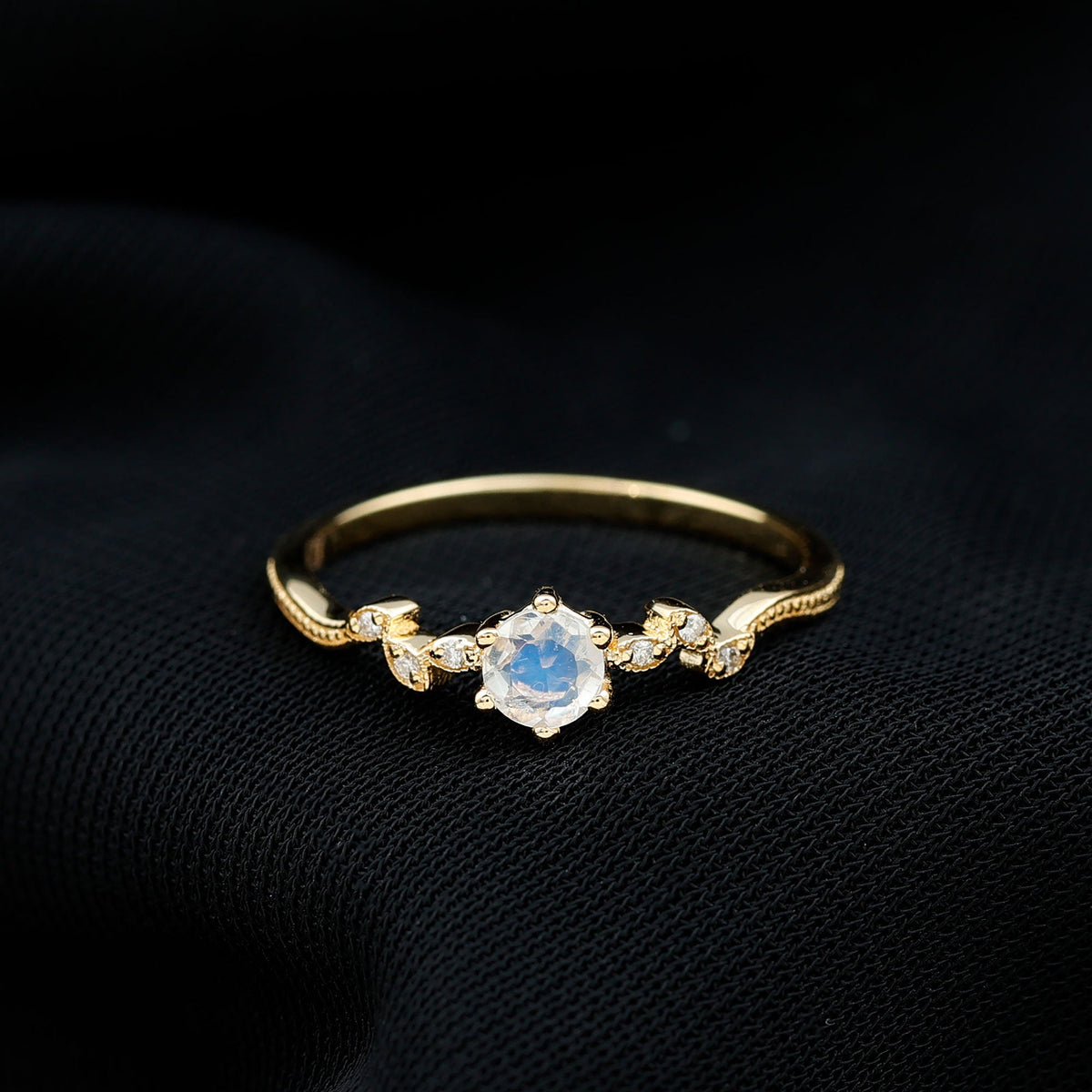 Nature-inspired moonstone and diamond promise ring for women by Rosec Jewels, featuring a delicate band with moonstone and diamond accents.
