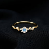 Nature-inspired moonstone and diamond promise ring for women by Rosec Jewels, featuring a delicate band with moonstone and diamond accents.