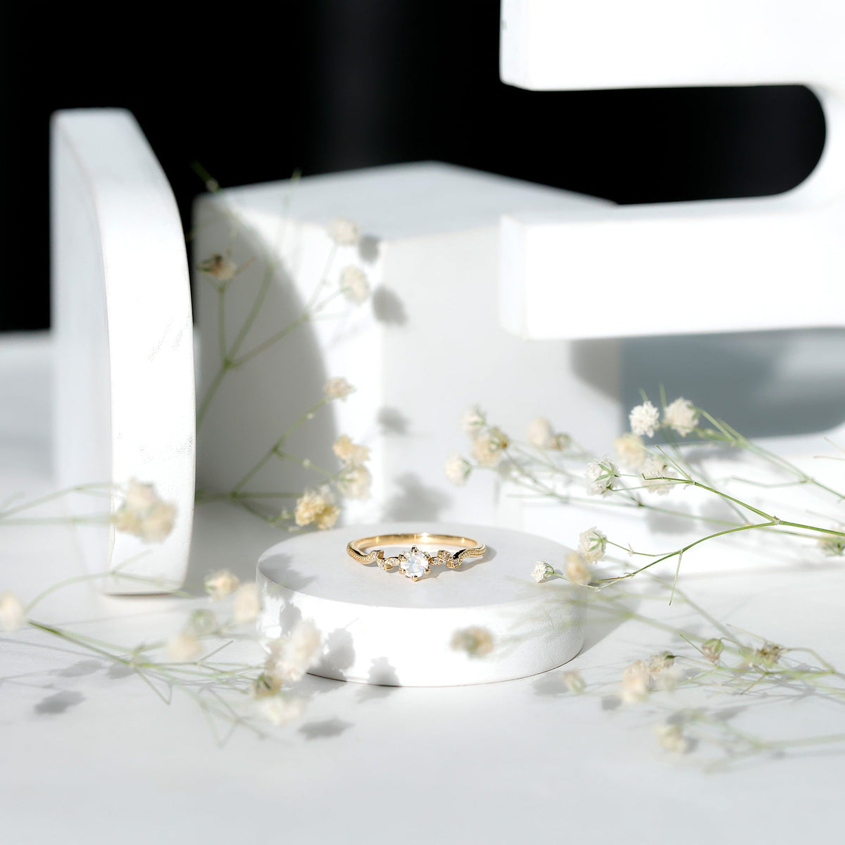 Nature-inspired moonstone and diamond promise ring for women by Rosec Jewels, featuring a delicate band and shimmering stones.