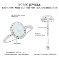 Oval moonstone engagement ring with diamond halo from Rosec Jewels, showcasing the elegant gemstone and sparkling surrounding diamonds.