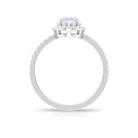 Oval moonstone engagement ring with diamond halo from Rosec Jewels, showcasing the gemstone and intricate halo setting.