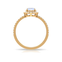 Oval moonstone engagement ring with diamond halo, featuring a sterling silver band and intricate design by Rosec Jewels.