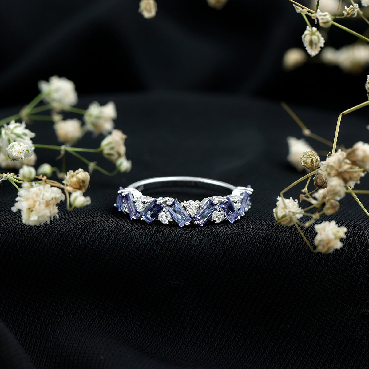 Baguette cut Tanzanite and diamond half eternity stackable ring by Rosec Jewels, featuring alternating blue gemstones and sparkling diamonds