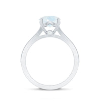 Rosec Jewels moonstone engagement ring with diamond side stones, showcasing a polished silver band and intricate design details.