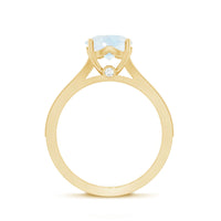Rosec Jewels designer moonstone engagement ring with diamond side stones, showcasing a sparkling moonstone centerpiece and elegant side accents.