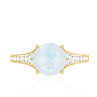 Rosec Jewels moonstone engagement ring with diamond side stones, showcasing a elegant design with a central moonstone and sparkling accents.