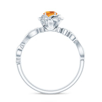 Nature-inspired Citrine Flower engagement ring by Rosec Jewels featuring a central diamond and intricate floral design.